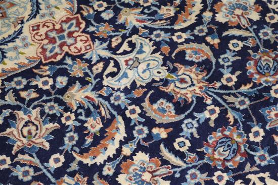 A Nain silk inlaid carpet, 295cm x 200cm.